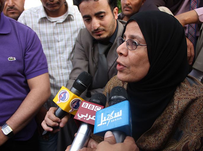 Yemen's Human Rights Minister Huriya Mashhoor answers journalists' questions as she joined youth activists who went on hunger strike and a sit-in to press authorities to release dozens of activists held since the 2011 uprising against ex-president on June 2, 2013 at the central prison compound in Sanaa, Yemen. In total, 58 men who participated in protests that forced ax-president to step down in February 2012, remain incarcerated, while the fate of 17 others remains unknown, according to local rights group Hood. AFP PHOTO STR
