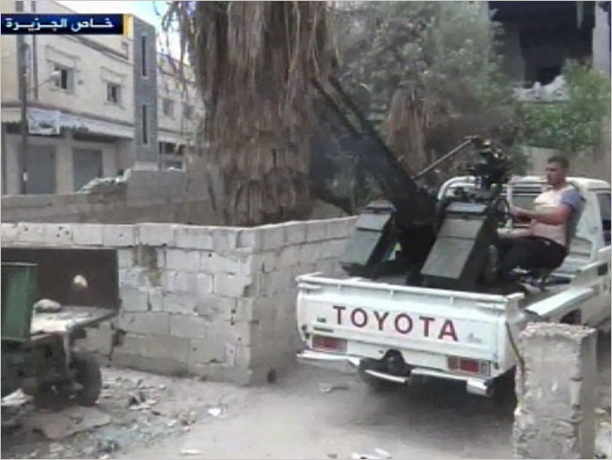 ‪الجيش الحر يواصل القتال في درعا‬  (الجزيرة- أرشيف)