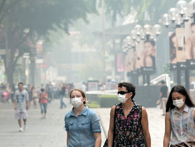 ‪سنغافورة: الضباب الدخاني قد يستمر أسابيع أو أكثر‬  سنغافورة: الضباب الدخاني قد يستمر أسابيع أو أكثر (الفرنسية)