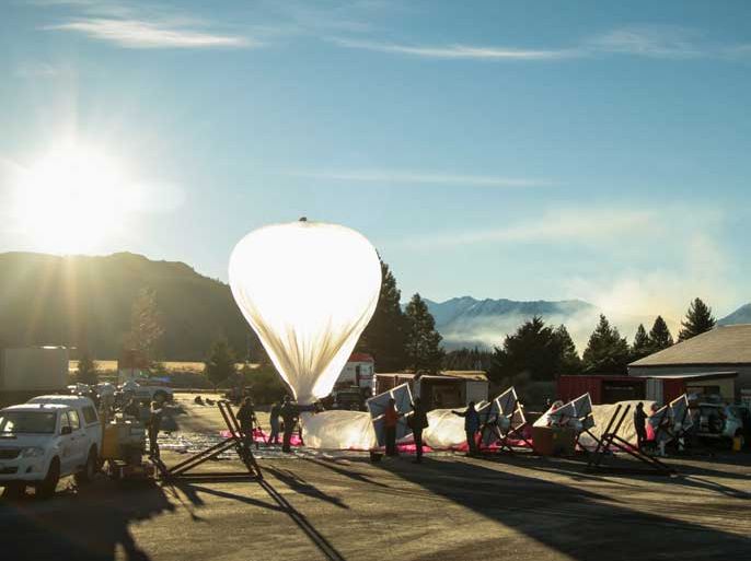 epa03745616 An undated handout photograph made available by Google on 15 June 2013 shows preparations underway for Google's 'Project Loon' in New Zealand. According to media reports 15 June 2013, Google is testing out balloons that will beam internet down to buildings on Earth, with the idea being that the balloons will provide internet access to people living in remote areas. EPA/JOHN SHENK / HANDOUT ATTENTION EDITORS: ONLY TO BE USED TO ILLUSTRATE THIS STORY HANDOUT EDITORIAL USE ONLY/NO SALES