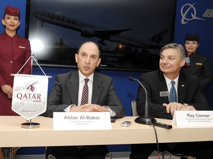 : Qatar Airways Chief Executive Officer Akbar Al-Baker (L) answers questions with Boeing Commercial Airplanes President and CEO Ray Conner (R) after the signing by Qatar Airways for nine additional 777 Extended Range Aircraft at Le Bourget airport on June 17 on the day of the opening of the International Paris Air show. AFP PHOTO