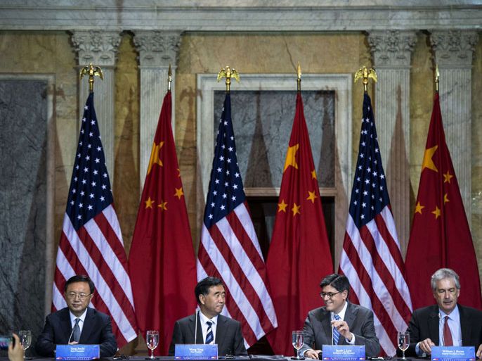 From left: Chinese State Councilor Yang Jiechi, Chinese Vice Premier Wang Yang, US Secretary of the Treasury Jack Lew and US Deputy Secretary of State William J. Burns wait to speak during the closing session of the 5th United States and China Strategic and Economic Dialogue at the US Department of the Treasury July 11, 2013 in Washington, DC. Officials from the United States and China are meeting to discus the two world powers' relationships during the 5th United States and China Strategic and Economic Dialogue