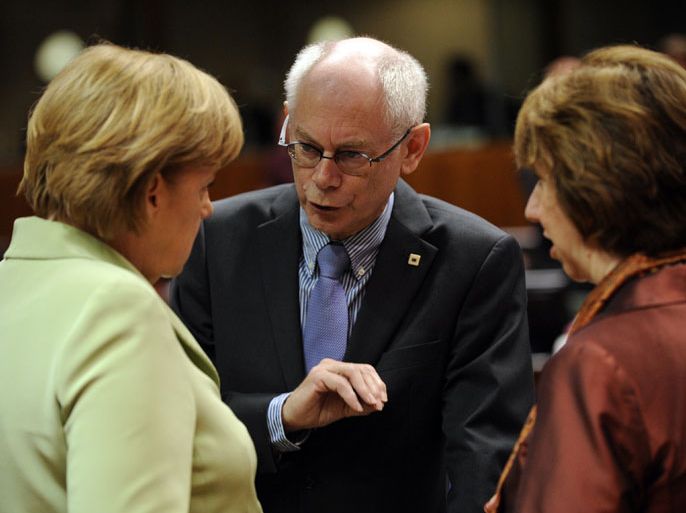 ej228 - Brussels, -, BELGIUM : (L-R) EU High Representative for Foreign Affairs and Security Policy Catherine Ashton, German Chancellor Angela Merkel and European Council President Herman Van Rompuy chat prior to a roundtable meeting on June 28, 2013 at the EU headquarters in Brussels, on the second day of the European Union leaders summit. European leaders on Friday agreed to deploy 8.0 billion euros ($10.4 billion) to help create jobs for young people at a summit that also backed a tentative deal on the EU's next trillion-euro budget, despite simmering doubts. AFP PHOTO / JOHN THYS