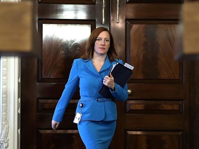 WASHINGTON, DC - JUNE 12: U.S. State Department spokeswoman Jen Psaki walks into the Treaty Room prior to a joint media availability held by U.S. Secretary of State John Kerry and British Foreign Secretary William Hague at the State Department June 12, 2013 in Washington, DC. Kerry had a bilateral meeting with Hague at the State Department.