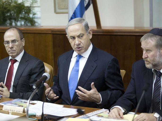 Israeli Prime Minister Benjamin Netanyahu speaks during the weekly cabinet meeting in his Jerusalem office, on July 14, 2013 .