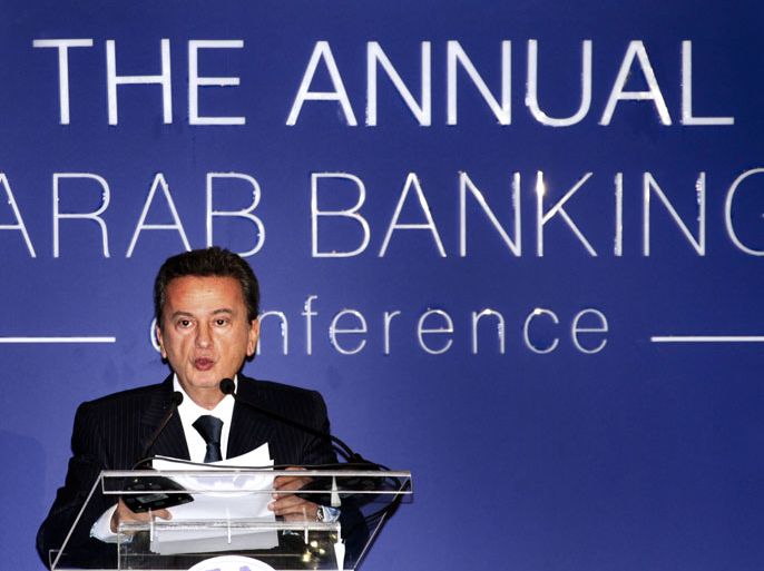 epa03013810 Lebanese Governor Bank of Lebanon Riad Salameh, speaks during the opening of The Annual Arab Banking Conference 2011, 'Future of the Arab World in Light of Recent Transitions – Conferences,' at the Phoenicia hotel in Beirut, Lebanon 24 November 2011. The 2011 Annual Arab Banking Conference of the Union of Arab Banks (UAB) is different from the previous conferences in its approach to the crisis, as UAB cannot ignore the current strategic events. The event is taking place on 24 - 25 November 2011. EPA/NABIL MOUNZER