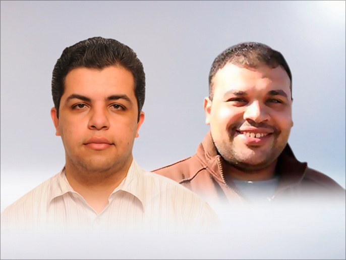 ‪السلطات المصرية لا تزال تحتجز الزميلين  عبد الله الشامي ومحمد بدر‬  (الجزيرة)