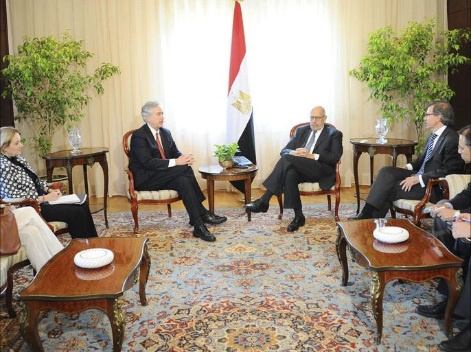 Egypt's interim Vice President Mohamed ElBaradei (4th R) speaks with U.S. Deputy Secretary of State William Burns (3rd L) during their meeting with high delegations in Cairo in this handout picture dated August 3, 2013. Senior U.S. and European envoys met the foreign minister of Egypt's army-installed government on Saturday in a push to resolve the political crisis brought on by the overthrow of President Mohamed Mursi and to head off more bloodshed. At the same time, the new government promised Mursi's supporters a safe exit from their protest camps and urged them to rejoin the political process.