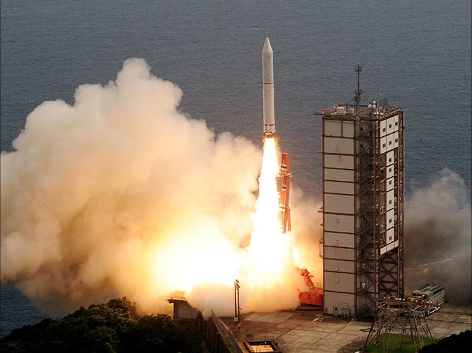 Japan's new solid-fuel rocket lifts off from the launch pad at the Japan Aerospace Exploration Agency's (JAXA) Uchinoura Space Center in Kimotsuki, Kagoshima prefecture, on Japan's southern island of Kyushu on September 14, 2013. The Epsilon rocket blasted off, carrying a telescope for remote observation of planets in a launch coordinated from a laptop computer-based command centre. JAPAN OUT AFP PHOTO / JIJI PRESS