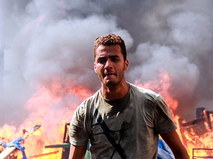 اعتقال أنس شرف يكشف سر أشهر صورة عن فض رابعة العدوية في مصر - وكالة الأناضول