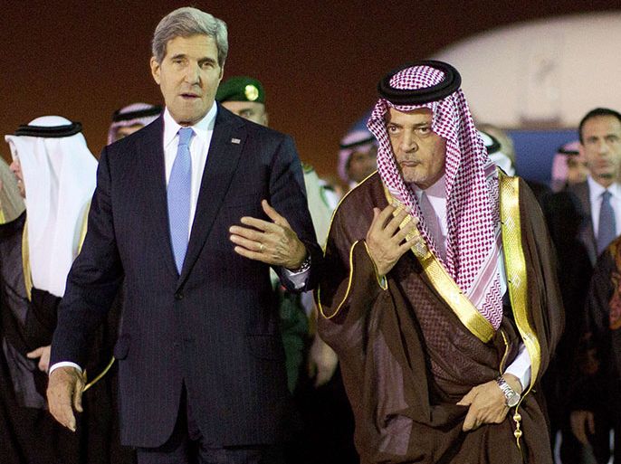 US Secretary of State John Kerry (L) is welcomed by Saudi Foreign Minister Prince Saud Al-Faisal bin Abdulaziz al-Saud (2nd-L), upon his arrival in Riyadh November 3, 2013