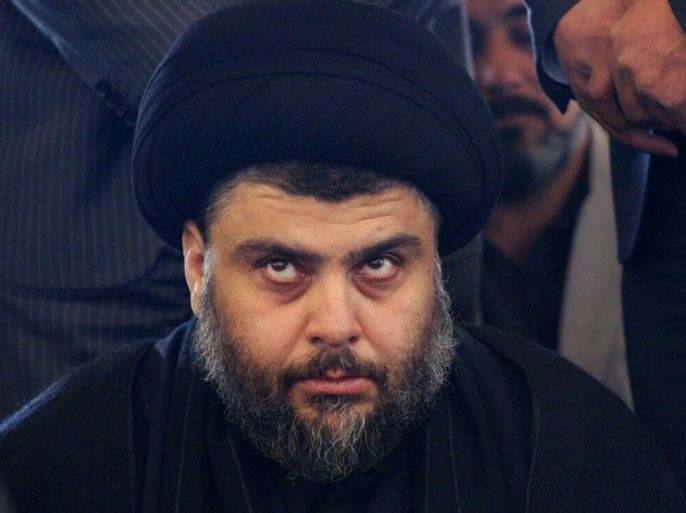 epa02909326 (FILE) A file picture dated 06 November 2010 shows Radical Iraqi Shiite cleric Moqtada al-Sadr attending the Friday prayer in the holy city of Najaf, southern Iraq. Reports state on 10 September that Shiite cleric al-Sadr in a statement posted on his website asked his militias to stop attacks against American forces based in Iraq until the withdrawal of US troops is over. EPA/KHIDER ABBAS