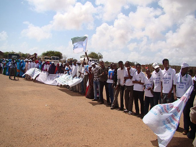 استقبال شعبي للرئيس الصومالي بمطار كيسمايو (الجزيرة)