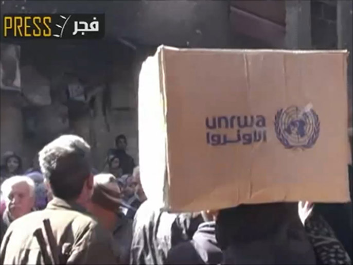 ‪وكالة الأونروا أعلنت إدخال مساعدات لمخيم اليرموك‬  (الجزيرة)