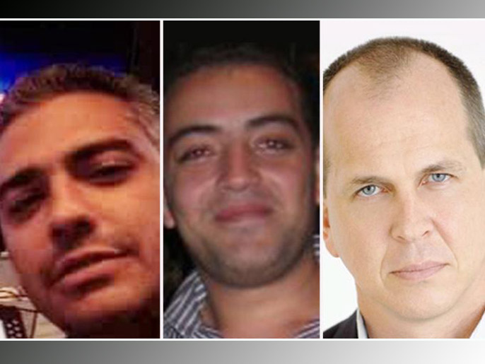 صحفيو الجزيرة بيتر غريستي (يمين) وباهر محمد (وسط) ومحمد فهمي(الجزيرة)
