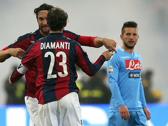 Bologna's forward Rolando Bianchi (L) celebrates with team mate Alessandro Diamanti after scoring a goal during an Italian Serie A football match between Bologna and Napoli at the Renato Dall'Ara stadium in Bologna on January 19, 2014. AFP