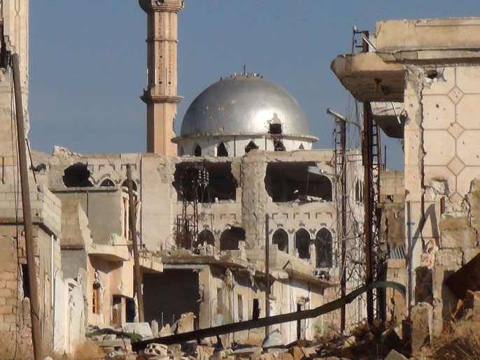 بعض مظاهر الدمار بمدينة حماة التي تشهد بعض مناطقها تصاعدا للأحداث (الفرنسية)