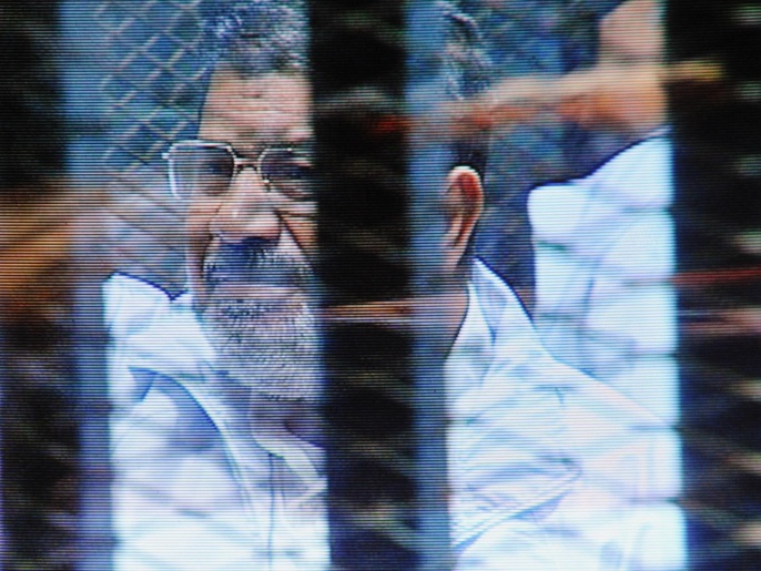 النائب العام لم يذكر إن كانت النيابة اتخذت إجراء قانونيا ضد مرسي (أسوشيتد برس)