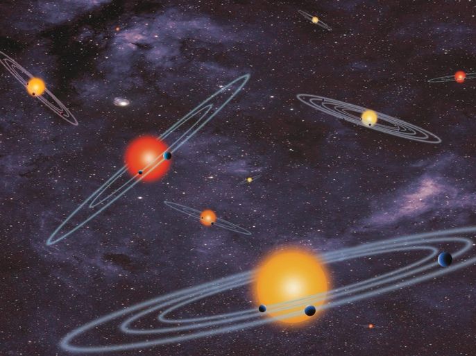 This handout artist conception provided by NASA depicts multiple-transiting planet systems, which are stars with more than one planet. The planets eclipse or transit their host star from the vantage point of the observer. This angle is called edge-on. Our galaxy is looking far more crowded as NASA Wednesday confirmed a bonanza of 715 newly discovered planets circling stars other than our sun. Four of those new planets are in the habitable zones where it is not too hot or not cold. NASA’s Kepler planet-hunting telescope nearly doubled the number of planets scientists have discovered in the galaxy, pushing the figure to about 1,700. Twenty years ago, astronomers had not found any planets outside our solar system. (AP Photo/NASA)