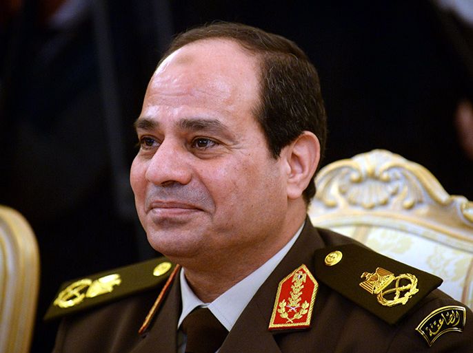 (FILES) A picture taken on February 13, 2014 shows Egyptian army chief Abdel Fattah al-Sisi smiling during a meeting with Russian Defence Minster in Moscow. Al-Sisi, who is expected to stand for president, was retained as defence minister in the new cabinet sworn in on March 1, 2014, state television showed. AFP