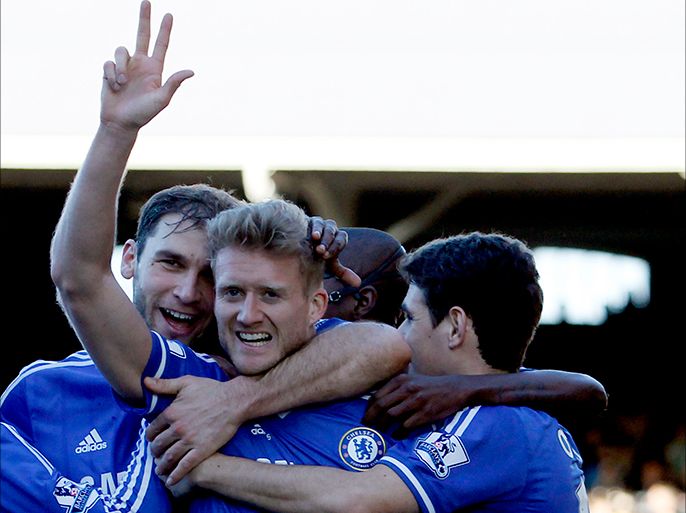 epa04105120 (L to R) Branislav Ivanovic, Andre Schuerrle and Oscar of Chelsea celebrate the third goal during the English Premier League soccer match between Fulham and Chelsea at Craven Cottage stadium, in London, Britain, 01 March 2014