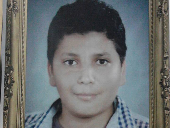 ‪الطفل أحمد خلف اعتقل بدلا من والده ووجهت له تهمة الانضمام لجماعة إرهابية‬ (الجزيرة)