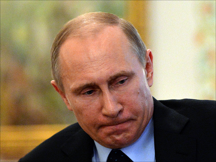 ‪‬  بوتين وقع اتفاقية لاعتبار جمهورية القرم ملحقة باتحاد روسيا(الأوروبية-أرشيف)