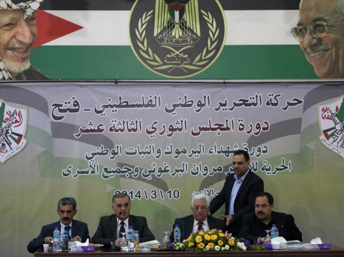 Palestinian president Mahmud Abbas (C) chairs a meeting of the Revolutionary Council of his ruling Fatah party in the West Bank city of Ramallah on March 10, 2014. AFP PHOTO/ABBAS MOMANI