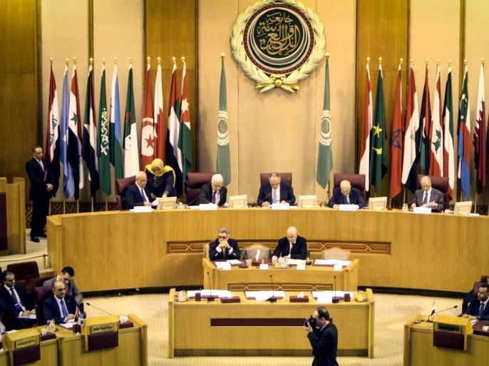 Foreign ministers from Arab countries gather at the Arab League headquarters in Cairo, on April 9, 2014. Arab foreign ministers met with Palestinian leader Mahmud Abbas to discuss floundering US-brokered peace talks with Israel ahead of a looming deadline. Abbas requested the meeting after Israel backtracked on releasing a final batch of Palestinian prisoners and reissued tenders for 708 settler homes in annexed Arab east Jerusalem. AFP PHOTO / MOHAMED EL-SHAHED