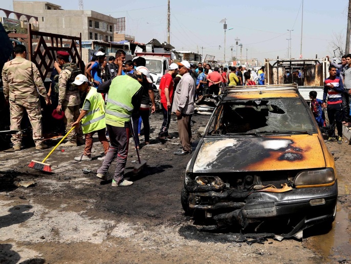 المكان الذي انفجرت فيه السيارة المفخخة بمدينة الصدر (أسوشيتد برس)