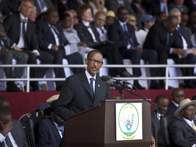 Rwandan President Paul Kagame addresses the public and dignitaries at a ceremony to mark the 20th anniversary of the Rwandan genocide, at Amahoro stadium in Kigali, Rwanda Monday, April 7, 2014. Sorrowful wails and uncontrollable sobs resounded Monday as thousands of Rwandans packed the country's main sports stadium to mark the 20th anniversary of the beginning of a devastating 100-day genocide. (AP Photo/Ben Curtis)
