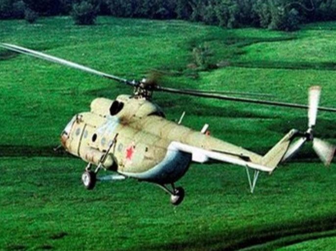 A Mi-8 helicopter, the same type as the one which crashed on Sunday, Oct. 26, 2008, in Kazan, flies somewhere at undisclosed location in Russia in this 2001 file photo. The Mi-8 helicopter making a test flight after repairs crashed on the outskirts the city of Kazan, about 700 km (450 miles) east of Moscow, killing four of the five people on board, the regional branch of Russian Emergency Situations Ministry said. Crashes of the Mi-8, a workhorse helicopter used widely in civilian aviation as well as by the military, occur frequently in Russia and often are blamed on poor maintenance and excessive age.
