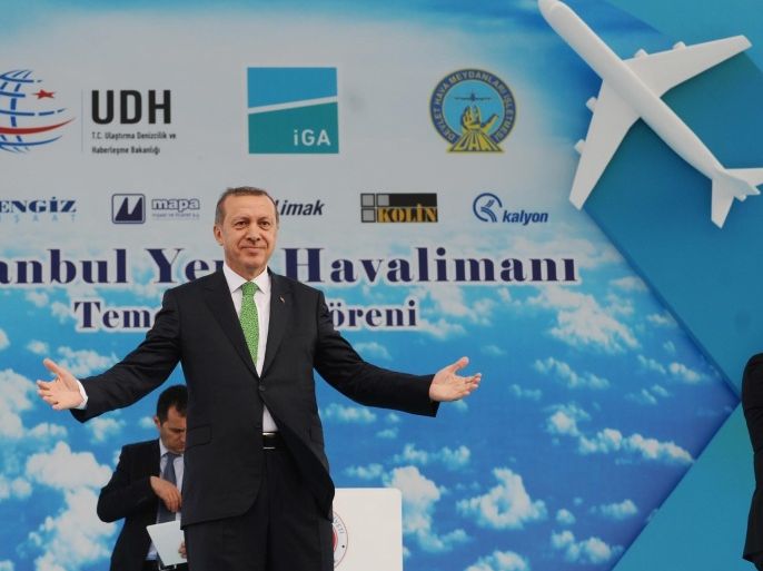 Turkish Prime Minister Recep Tayyip Erdogan gestures during the Istanbul's third airports first stone cerenomy on June 7 ,2014 in Istanbul. Erdogan laid the first stone for Istanbul's third airport, a multi-billion dollar project expected to create one of the world's busiest airports. AFP PHOTO / OZAN KOSE