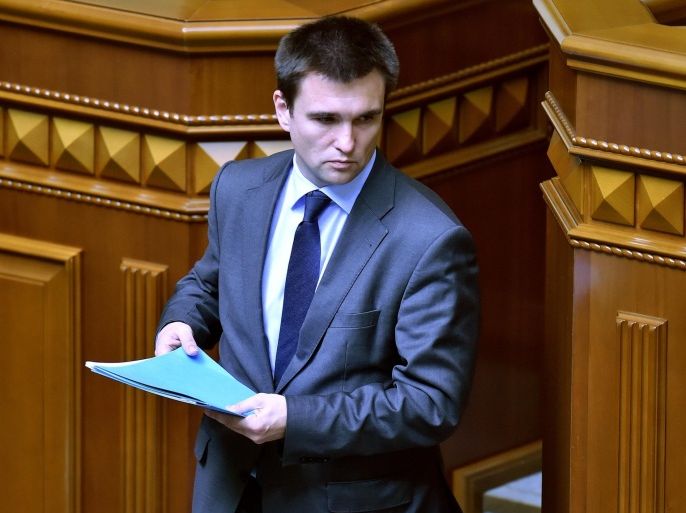Pavlo Klimkin leaves after his speech as Ukraine's parliament confirmed him as new foreign minister in Kiev on June 19, 2014. Klimkin, 46, the current ambassador to Germany who also represents Kiev in peace negotiations with Russia, replaces acting foreign minister Andriy Deshchytsya, who became embroiled in controversy at the weekend when he used a swearword to describe Russian President Vladimir Putin while trying to restrain protesters who attacked Moscow's embassy compound in Kiev. AFP PHOTO / SERGEI SUPINSKY