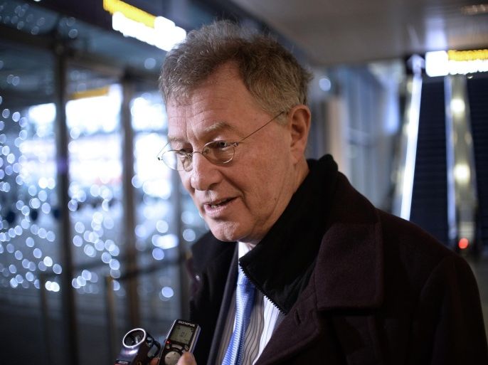 The UN's special envoy to Ukraine Robert Serry answers journalists' questions pictured upon his arrival at Kiev airport on March 6, 2014, one day after cutting short his mission after he was threatened by unidentified gunmen, an assistant traveling with him. AFP PHOTO / DIMITAR DILKOFF