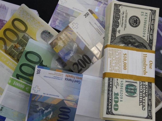 الدولار ارتفع مقابل سلة من العملات 8% منذ بداية 2014 (رويترز)