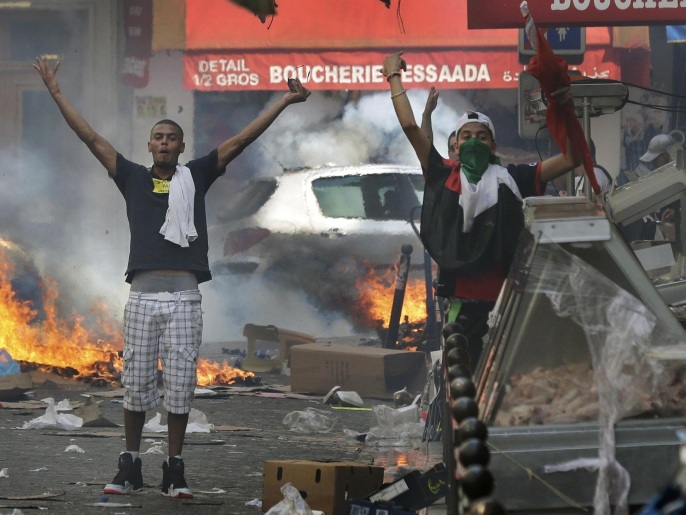 مظاهرة في باريس تحولت لأعمال عنف الأسبوع الماضي (رويترز)