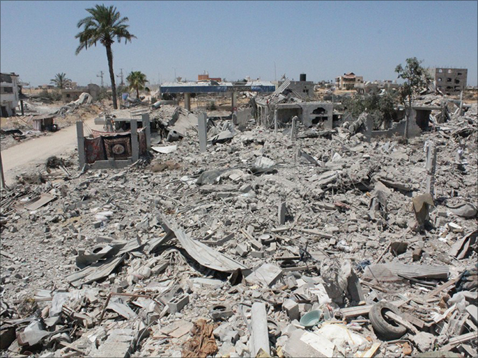 جانب من الدمار الواسع الذي لحقببلدة خزاعة في قطاع غزة (الجزيرة نت)