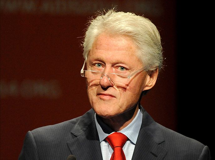 epa04326977 Former US President Bill Clinton during his speech at the 2014 International AIDS Conference, in Melbourne, Australia, 23 July 2014. Danish researchers said on 22 July they had been able to activate hidden HIV-infected cells using a cancer drug, making it easier to then kill the virus in the body