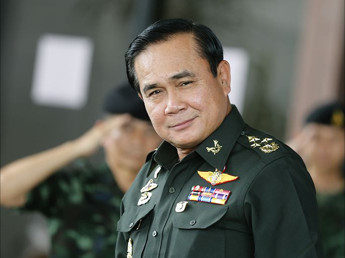 A file picture dated 13 June 2014 shows Thai army chief and junta head General Prayuth Chan-ocha smiling as he leaves after a meeting at the Army Club in Bangkok, Thailand. Thailand's National Legislative Assembly (NLA) elected junta leader Prayuth Chan-Ocha to be the country's 29th prime minister by a unanimous vote of 191 out of the 194 assembly members, with the remaining three absent on sick leave, on 21 August 2014. After the military seized the power on 22 May 2014 after months of prolonged political conflict and violence. EPA/NARONG SANGNAK
