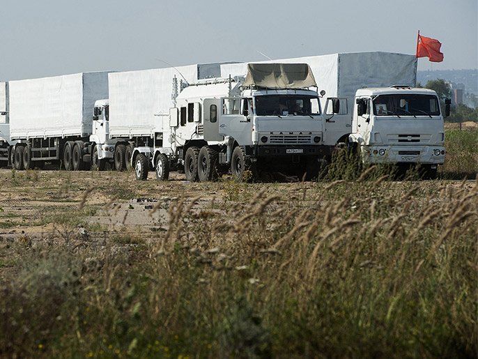 ‪قافلة المساعدات الروسية ستتولى اللجنة الدولية للصليب الأحمر توزيعها‬  قافلة المساعدات الروسية ستتولى اللجنة الدولية للصليب الأحمر توزيعها (الفرنسية)