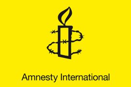 شعار منظمة العفو الدولية - الموسوعة -