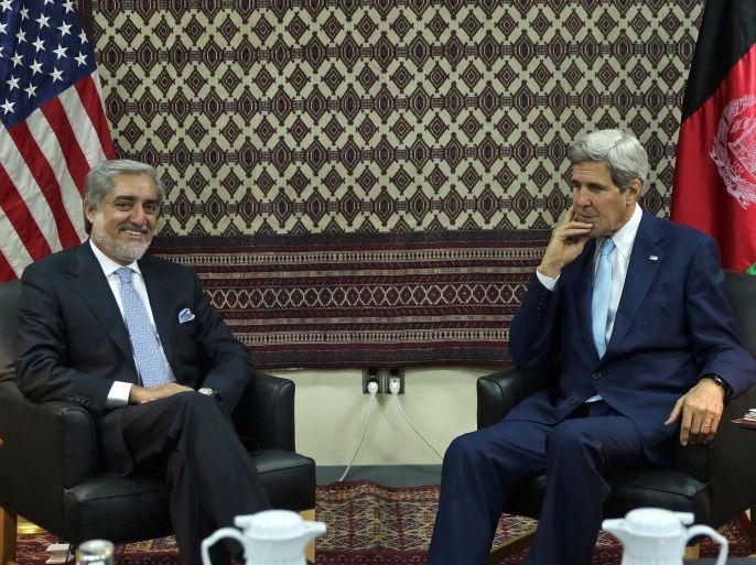 U.S. Secretary of State John Kerry, right, listens to Afghanistan's Presidential candidate Abdullah Abdullah, during a meeting at U.S. embassy in Kabul, Afghanistan, Thursday, Aug. 7, 2014. (AP Photo/Massoud Hossaini, Pool)