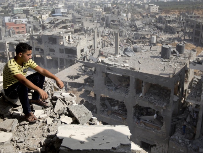 الرئيس الفلسطيني دعا إلى أوسع دعم دولي لإعمار ما دمره العدوان على غزة (غيتي/الفرنسية)