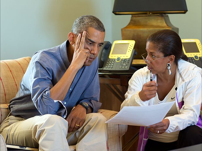 epa04350217 A handout picture provided by the White House on 12 August 2014 shows US President Barack Obama (L) meeting with National Security Advisor Susan E. Rice following foreign leader phone calls, from Chilmark, Massachusetts, USA, 11 August 2014. US President Barack Obama said on 11 August the naming of a new prime minister in Baghdad is a promising step forward in the effort to form a unifying Iraqi government. Obama said he called to congratulate Shiite politician Haidar al-Abadi after he was named prime minister-designate. He urged al-Abadi to name a new cabinet 'that is inclusive of all Iraqis' as quickly as possible. EPA/PETE SOUZA/THE WHITE HOUSE/HANDOUT HANDOUT EDITORIAL USE ONLY