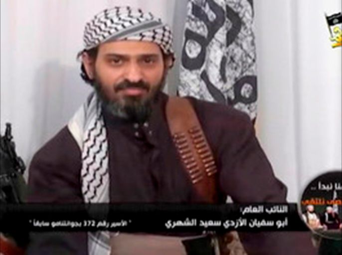 epa01613143 A handout photograph made available by a Jihadist website on 25 January 2009, shows the alleged deputy leader of Al Qaeda's Yemeni branch Said al-Shihri, Saudi national known at Guantanamo as prisoner number 372 appearing in an Islamist video posted on internet on 24 January 2009