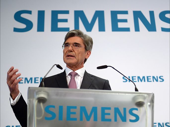 epa04194580 Siemens AG chairman of the managing board Joe Kaeser speaks at the Siemens half-year press conference in Berlin, Germany, 07 May 2014. EPA/RAINER JENSEN