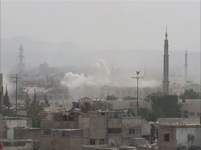 معارك بين قوات النظام السوري ومقاتلي المعارضة بأطراف دمشق