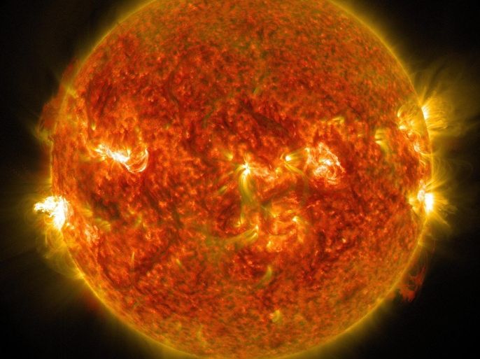 A handout image made available by NASA and the Solar Dynamics Observatory on 26 August 2014 shows flare erupting on the left side of the sun, 24 August 2014. According to NASA, the sun emitted a mid-level solar flare, a powerful burst of radiation. EPA/NASA / SOLAR DYNAMICS OBSERVATORY / HANDOUT