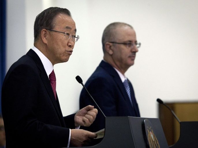 U.N. Secretary General Ban Ki-moon, left and Palestinian Prime Minister Rami al-Hamdallah give a press conference following their meeting at the Palestinian Authority headquarters, in the West Bank city of Ramallah, Monday, Oct. 13, 2014. At a Sunday meeting in Cairo donors pledge $2.7 billion for Gaza reconstruction. (AP Photo/Nasser Nasser)